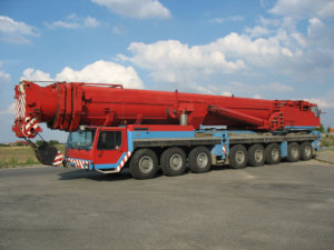 red heavy crane truck